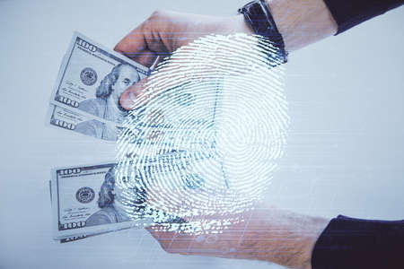 Multi exposure of fingerprint drawing hologram and USA dollars bills and man hands. security concept.の写真素材