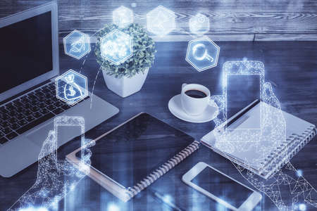 Double exposure of tech theme sketch over cell phone background. Concept of technology