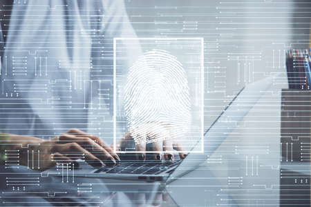 Double exposure of woman hands typing on computer and fingerprint drawing. Security concept.