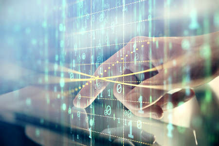 Multi exposure of mans hand holding and using a digital device and data theme drawing. Innovation concept.の写真素材