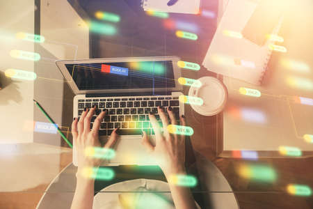 Double exposure of woman hands working on computer and data theme hologram drawing. Top View....