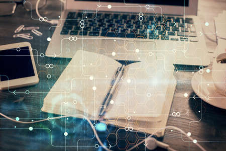 Multi exposure of data theme drawings and desk with open notebook background. Concept of educationの写真素材