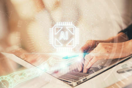 Double exposure of woman hands working on computer and data theme hologram drawing. Tech concept.