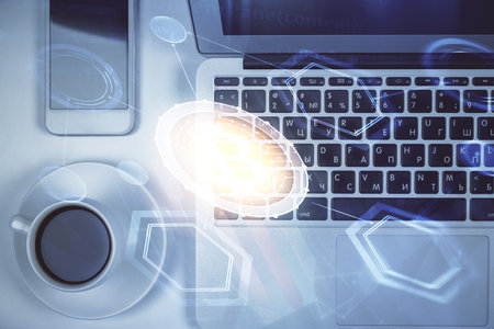 Blockchain theme hologram drawings over computer on the desktop background. Top view. Double exposure.の写真素材