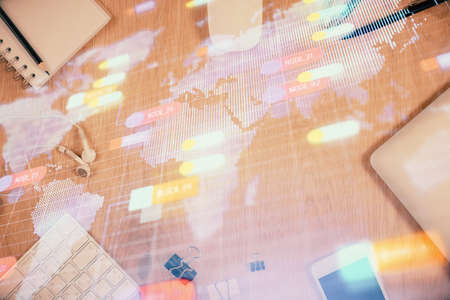 Multi exposure of technology theme drawing over work table desktop. Top view. Global data analysis concept.の写真素材
