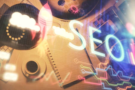 Double exposure of SEO drawing and table top veiw. Concept of search optimization.の写真素材
