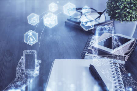 Double exposure of tech theme sketch over cell phone background. Concept of technology