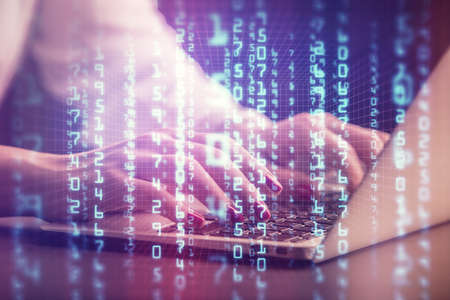 Multi exposure of woman hands working on computer and data theme hologram drawing. Tech concept.