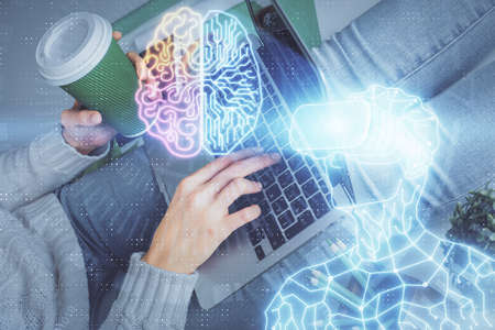 Double exposure of woman hands typing on computer and man in AR glasses drawing. Education concept.の写真素材