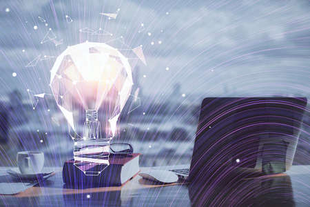 Double exposure of bulb drawing and desk with open notebook background. Concept of idea