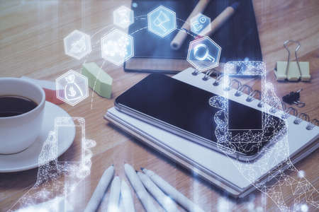 Double exposure of tech theme sketch over cell phone background. Concept of technology