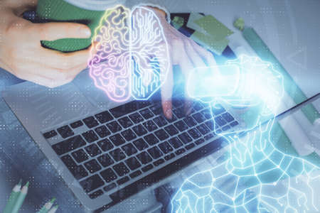 Double exposure of woman hands typing on computer and man in AR glasses drawing. Education concept.の写真素材