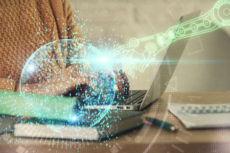 Double exposure of woman hands working on computer and data theme hologram drawing. Tech concept.