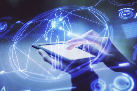 Double exposure of education theme sketch hologram and woman holding and using a mobile device.の写真素材