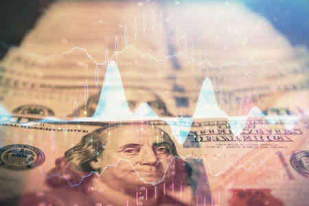 Double exposure of forex graph drawing over us dollars bill background. Concept of financial markets.の写真素材
