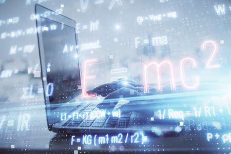 Double exposure of woman hands typing on computer and formula hologram drawing. Education concept.