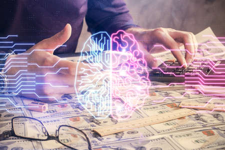 Double exposure of man's hand holding and using a digital device and brain hologram drawing. Data concept.の写真素材