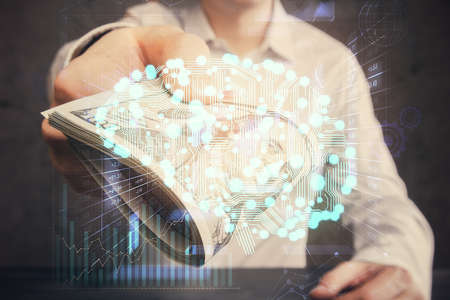 Multi exposure of brain drawing hologram and us dollars bills and man hands. Ai invest concept