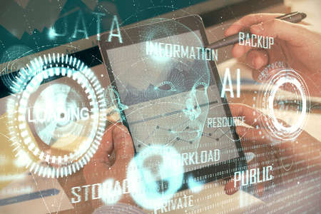 Multi exposure of man's hands holding and using a digital device and data theme drawing. Innovation concept.の写真素材