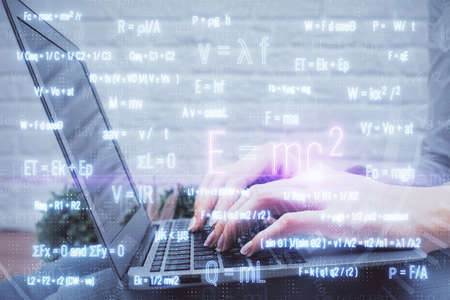 Double exposure of woman hands typing on computer and formula hologram drawing. Education concept.