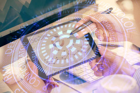 Multi exposure of man's hands holding and using a digital device and data theme drawing. Innovation...