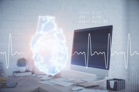 Double exposure of heart drawing and office interior background. Concept of medical education.の写真素材