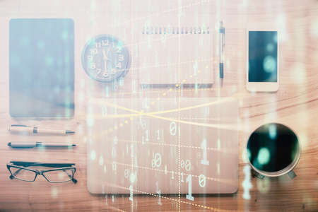 Multi exposure of technology theme drawing over work table desktop. Top view. Global data analysis concept.の写真素材