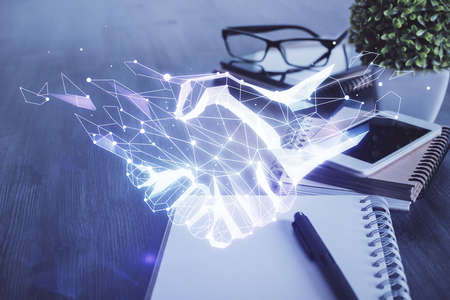 Double exposure of handshake sketch over cell phone background. Concept of partnershipの写真素材