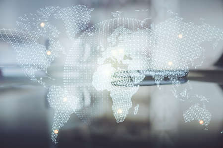 Double exposure of financial theme drawing hologram over coffee cup background in office. Concept of international business.の写真素材