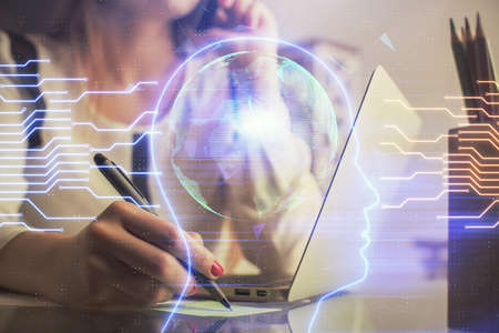 Multi exposure of woman hands working on computer and human brain hologram drawing. Ai tech concept.の写真素材