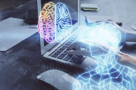 Double exposure of woman hands typing on computer and man in AR glasses drawing. Education concept.の写真素材