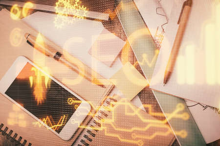 Double exposure of SEO hologram drawing over desktop. Top view. Search optimization concept.