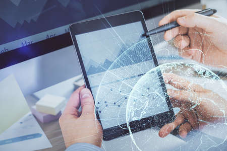 Double exposure of man's hands holding and using a phone and social network theme drawing.