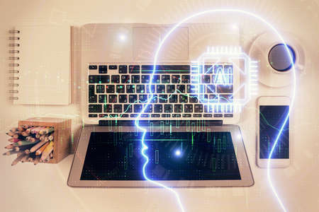 Double exposure of brain drawing hologram over topview work table background with computer. Concept of big data.の写真素材