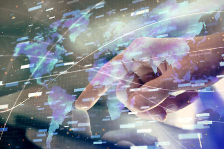 Multi exposure of man's hand holding and using a digital device and data theme drawing. Innovation concept.の写真素材