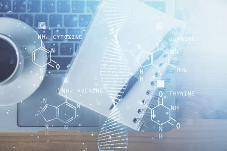Double exposure of dna theme drawing and work table top veiw. Concept of education.