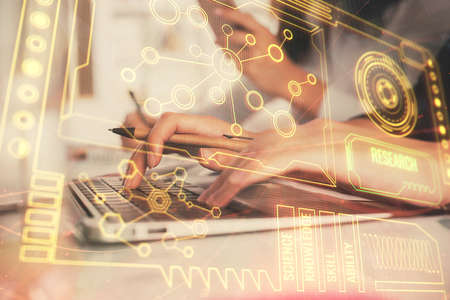 Multi exposure of woman hands working on computer and data theme hologram drawing. Tech concept.