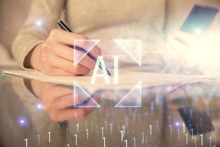 Double exposure of technology sketch hologram and woman holding and using a mobile device.の写真素材