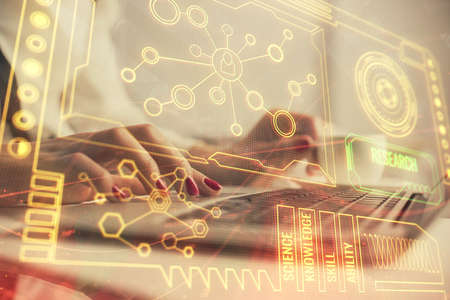 Multi exposure of woman hands working on computer and data theme hologram drawing. Tech concept.
