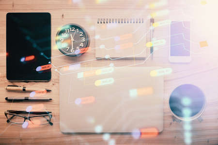 Multi exposure of technology theme drawing over work table desktop. Top view. Global data analysis...