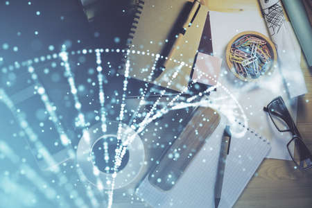 Double exposure of dna theme drawing and work table top veiw. Concept of education.の写真素材