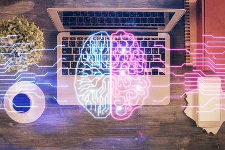 Double exposure of brain drawing hologram over topview work table background with computer. Concept of big data.の写真素材