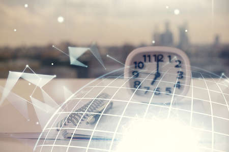 Multi exposure of world map drawings and desk with open notebook background. Concept of globolizationの写真素材