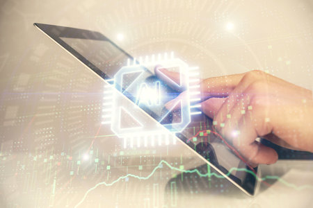 Multi exposure of man's hand holding and using a digital device and data theme drawing. Innovation concept.の写真素材
