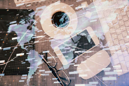 Multi exposure of technology theme drawing over work table desktop. Top view. Global data analysis concept.の写真素材