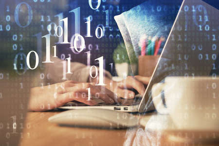 Double exposure of woman hands working on computer and data theme hologram drawing. Tech concept.