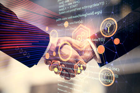 Double exposure of data theme hologram and handshake of two men. Partnership in IT industry concept.