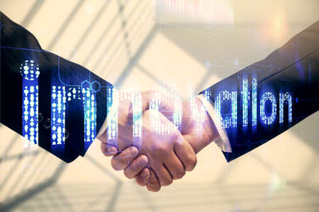 Double exposure of data theme hologram and handshake of two men. Partnership in IT industry concept.の写真素材