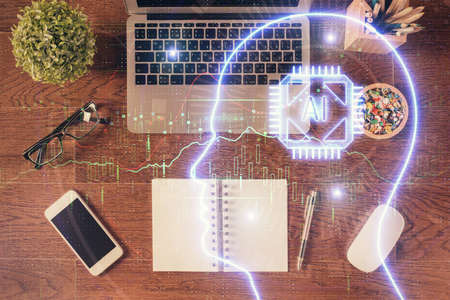 Double exposure of brain drawing hologram over topview work table background with computer. Concept...