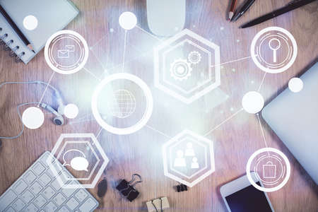 Double exposure of social network theme drawing over table with phone. Top view. People connecting...